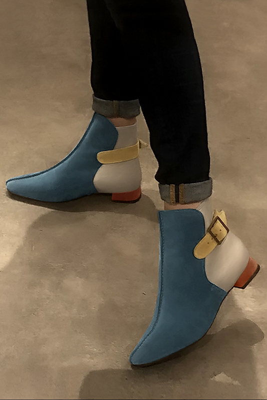 Peacock blue, gold and mustard yellow women's ankle boots with buckles at the back. Square toe. Flat flare heels. Worn view - Florence KOOIJMAN